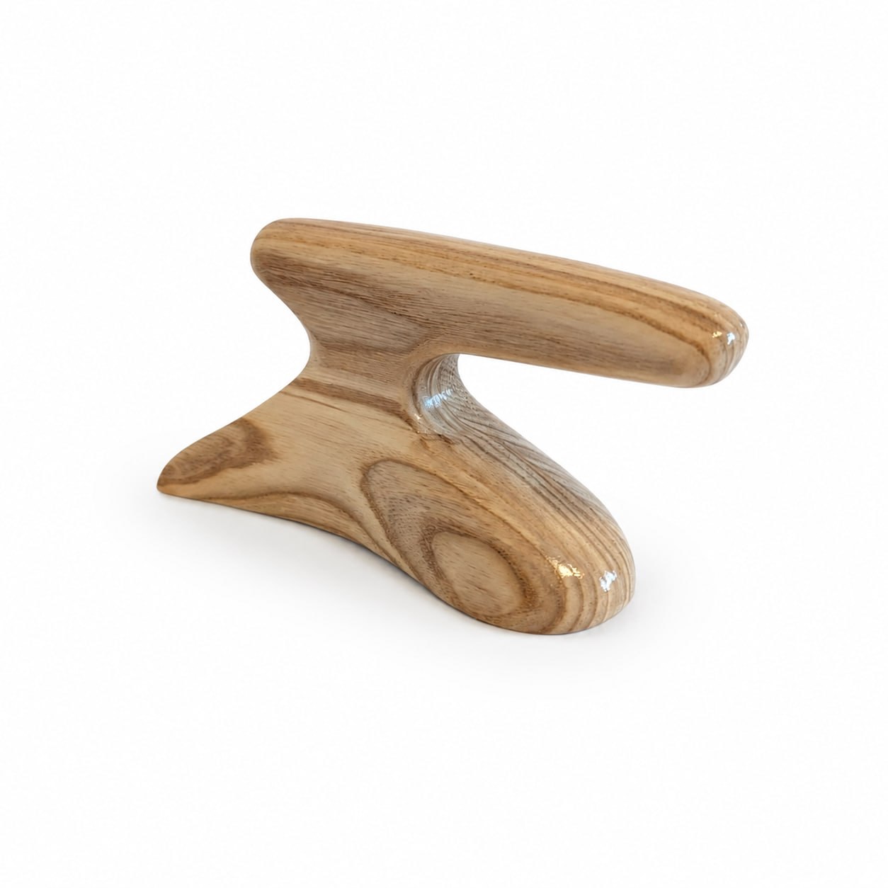 Wooden foot tolliker for millinery and custom felt hat making. This tool helps shape and refine felt hat brims, smooth the felt surface, and define the brim break during blocking and finishing
