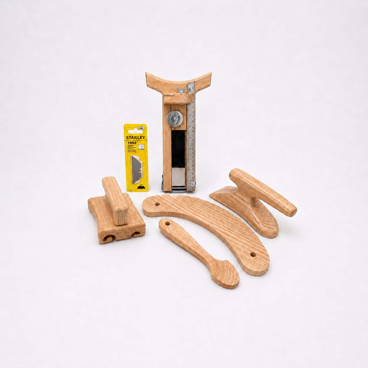 Wooden millinery tools set with hat brim cutter, curler, puller, tolliker, and replacement blades