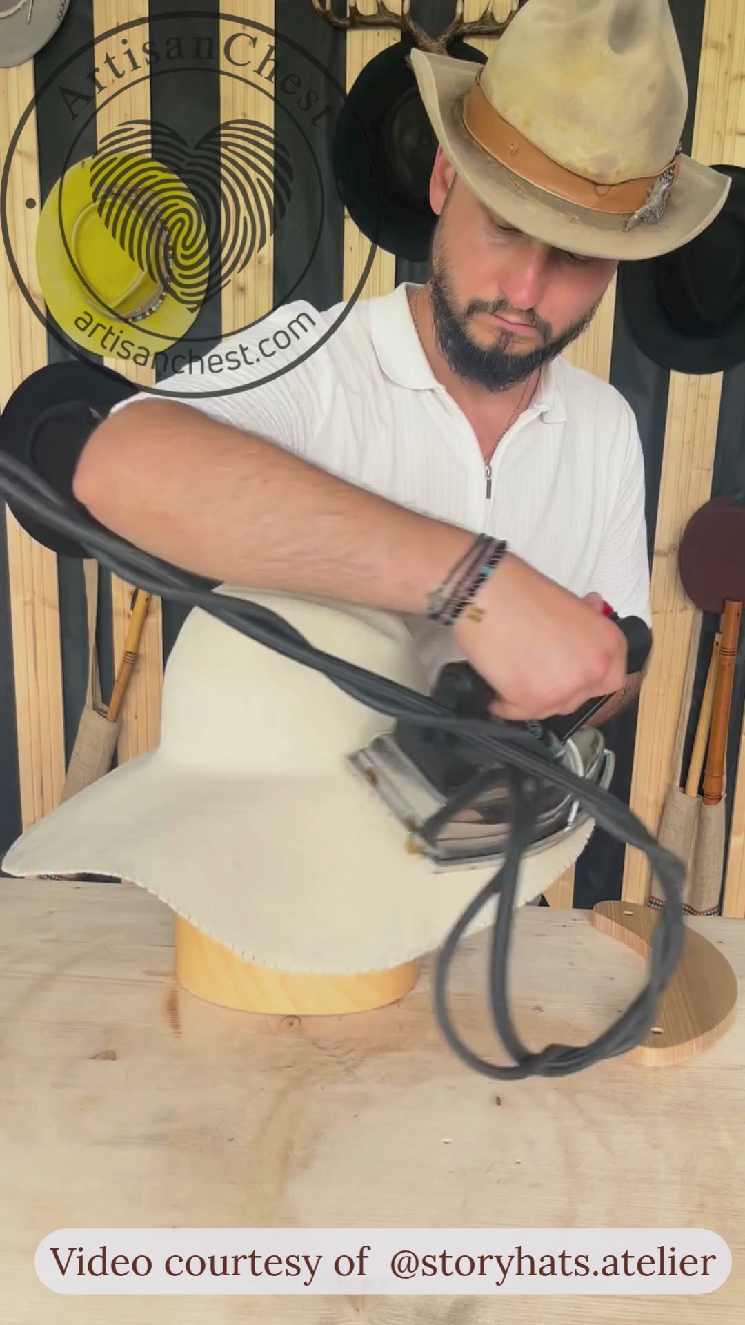 Video showing how a puller downer, pusher downer, and foot tolliker are used during felt hat blocking and finishing. The demonstration shows how to pull felt into position, press blocking cord down, define the brim break, and refine the felt hat brim with wooden millinery tools.