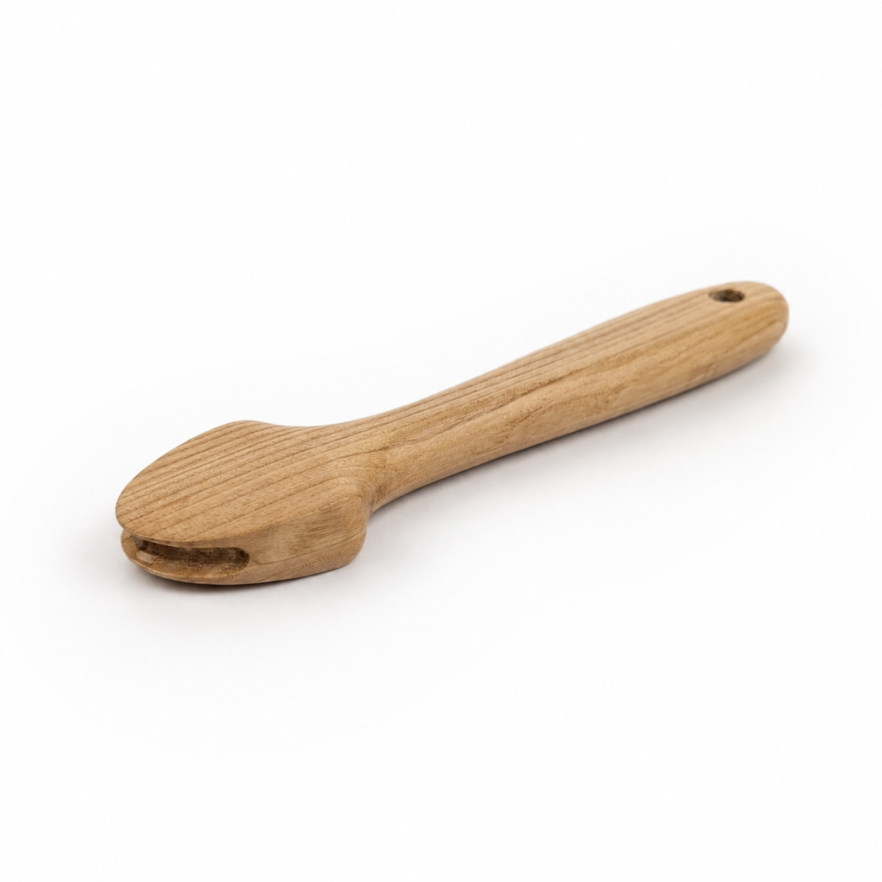 Side view of wooden pusher downer for pressing blocking cord in millinery